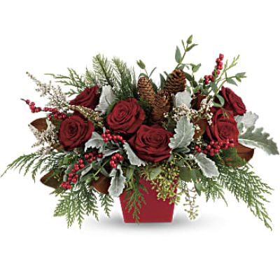 <p>Deck the halls, and table, with this artisanal mix of winter greens, berries and roses, artfully arranged in a tapered red cube.</p>