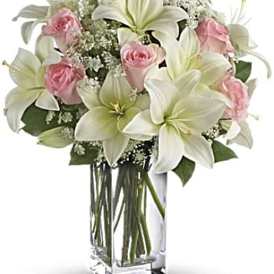 <div id="mark-3" class="m-pdp-tabs-marketing-description">Stunning in its simplicity, this innocent harmony of light pink roses and snow white lilies are a heartfelt way to send your very best. The classic, clear rectangular glass vase keeps the focus on the heavenly beauty of the blooms.</div>
<p> </p>
<div id="desc-3">
<ul>
<li>Light pink roses and white asiatic lilies form a fragrant bouquet with delicate touches of Queen Anne's lace and rich green salal.</li>
</ul>
</div>